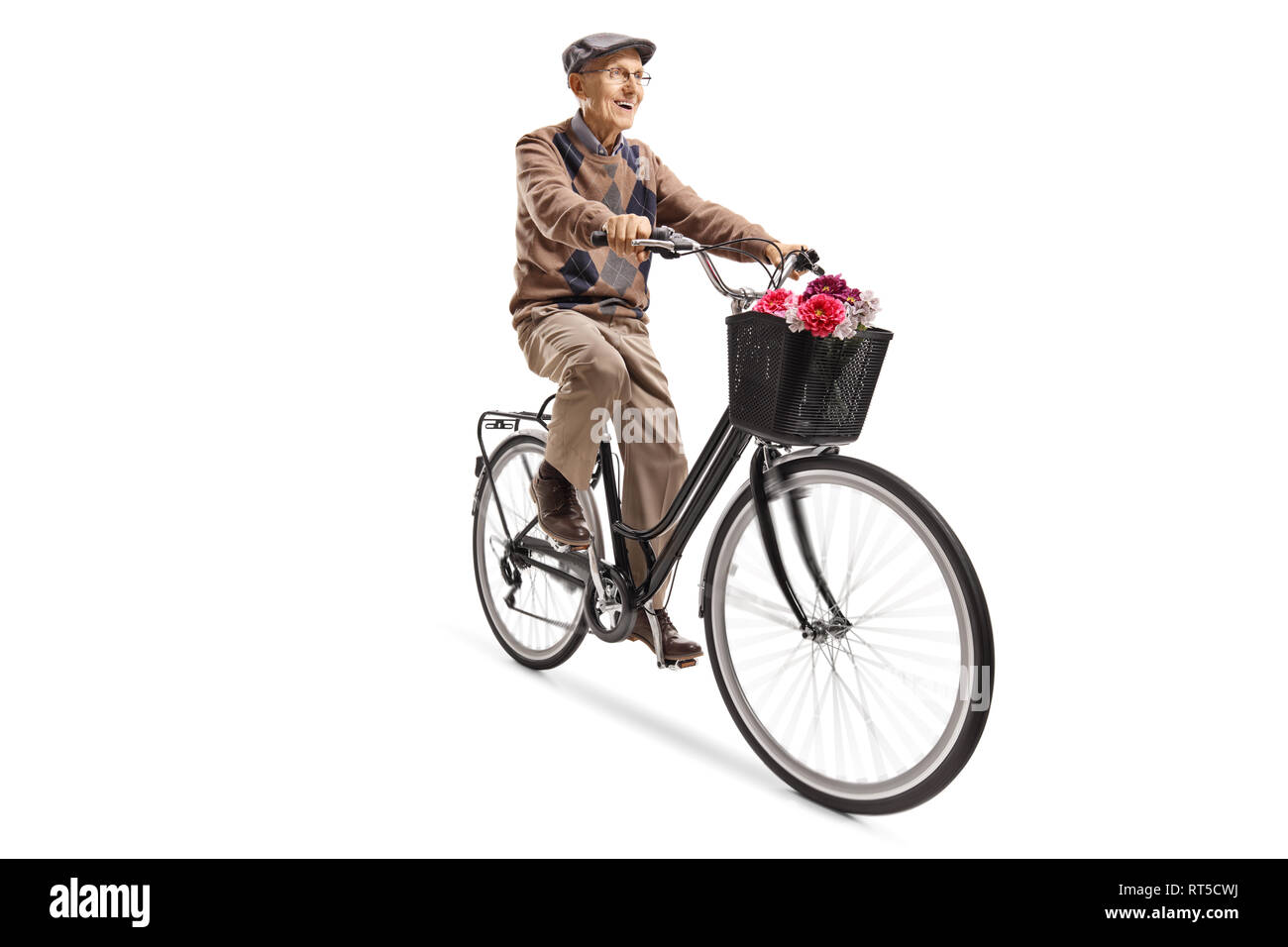Full length shot of an elderly gentleman riding a bicycle with flowers in a basket isolated on white background Stock Photo