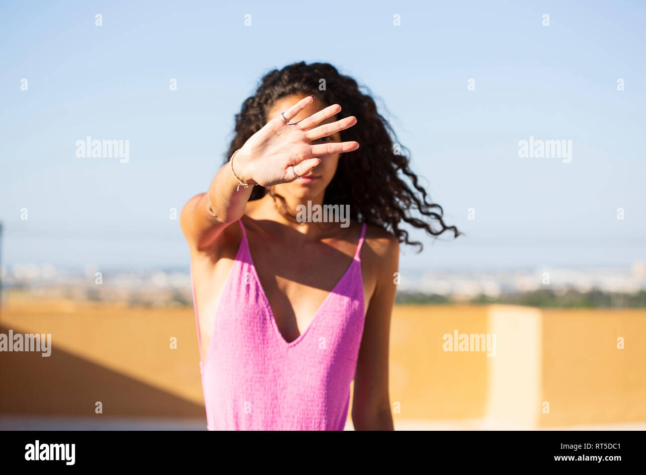 Portrait of teenage girl, obscured face Stock Photo