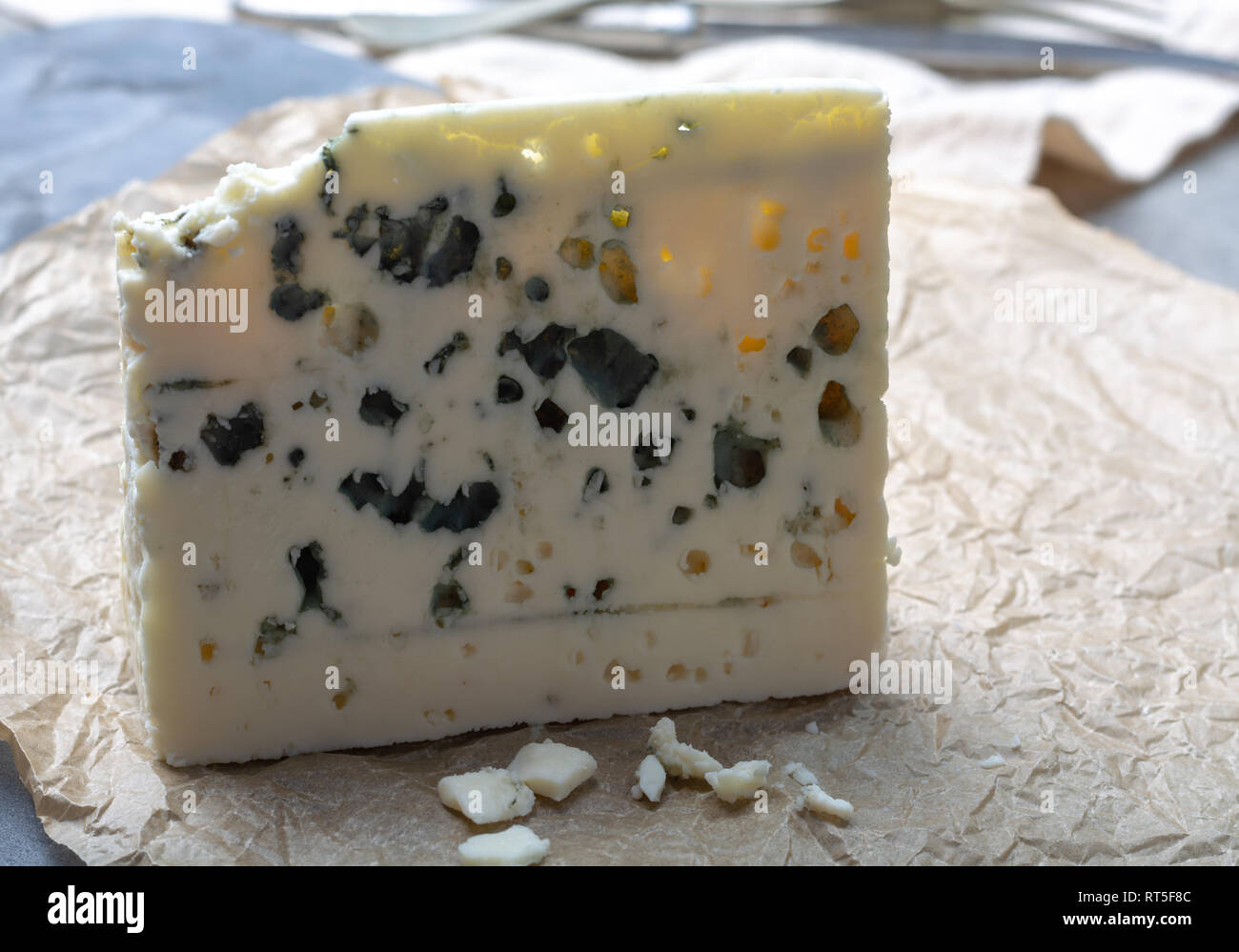Piece of French blue cheese Roquefort, made from sheep milk in caves of