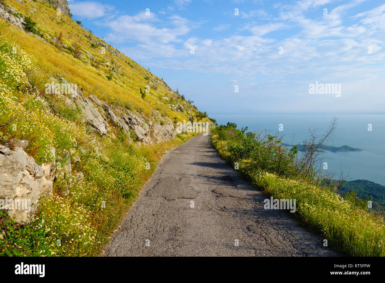 Montenegro, mountain road at south shore of Lake Skadar Stock Photo