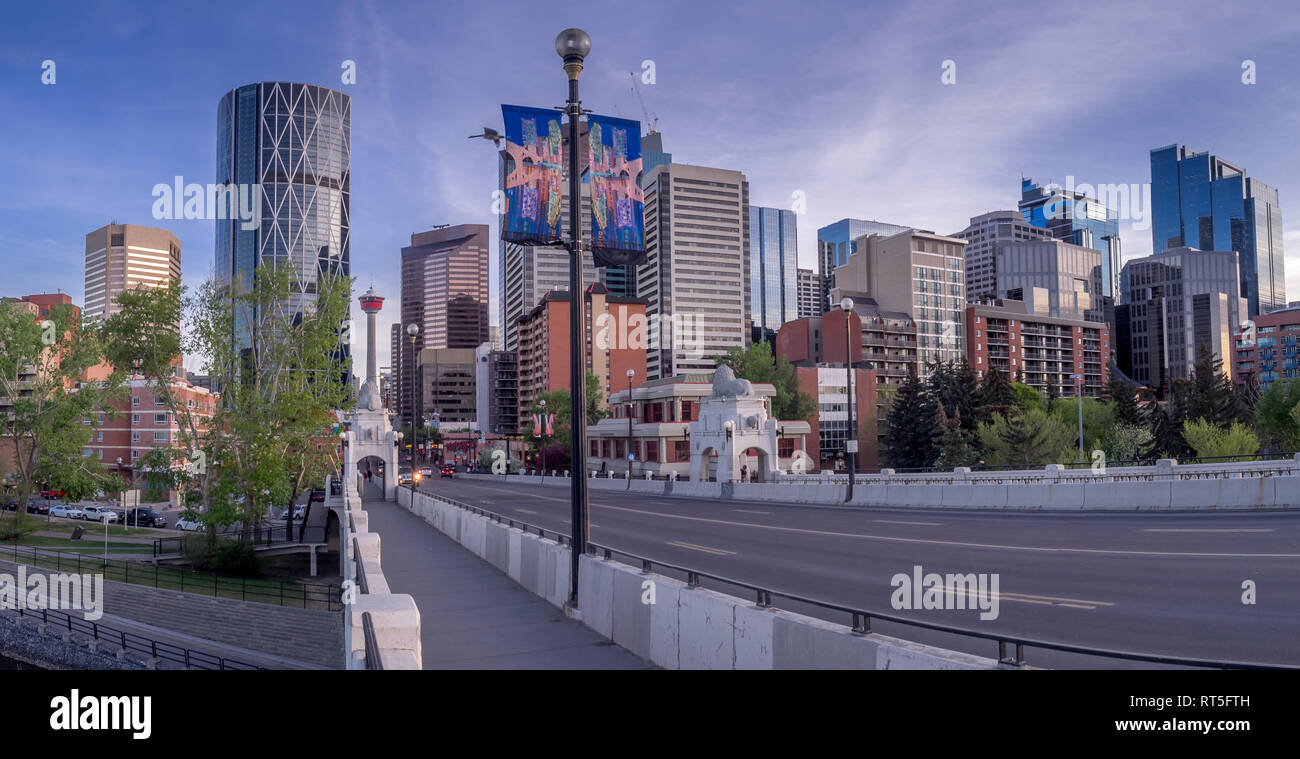 Calgary skyline at night with Bow River and Centre Street Bridge. Calgary is a major city on the Canadian prairie and a centre for oil and gas. Stock Photo