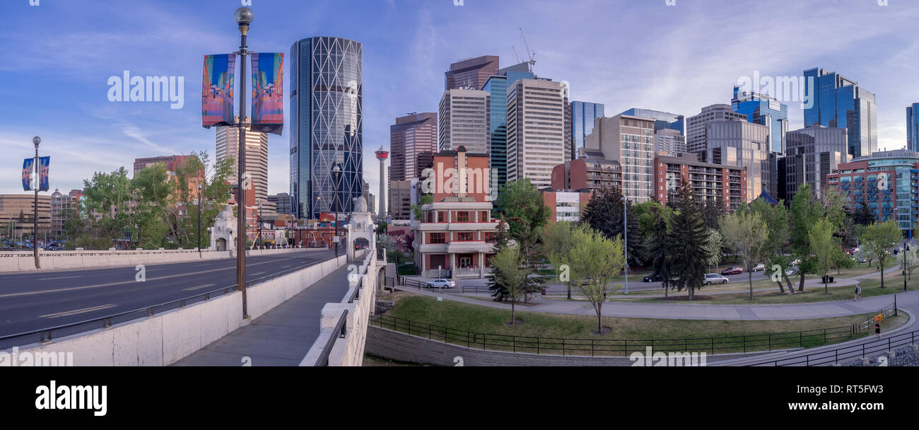 Calgary skyline at night with Bow River and Centre Street Bridge ...