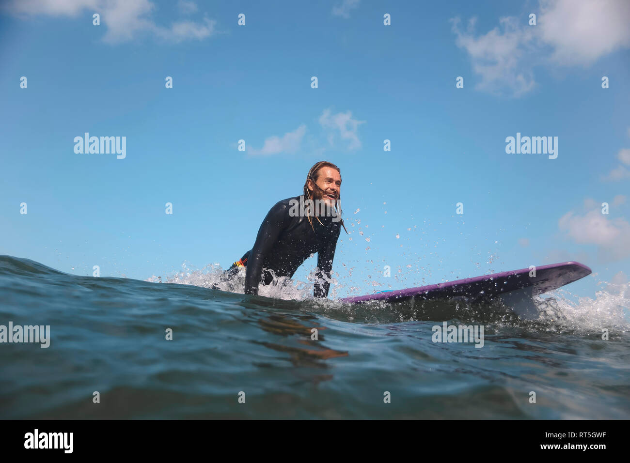Indonesia, Bali, Canggu, surfer on surfboard Stock Photo Alamy