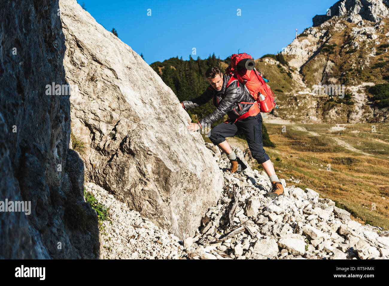 Couple mountain hiking in rocky terrain Stock Photo