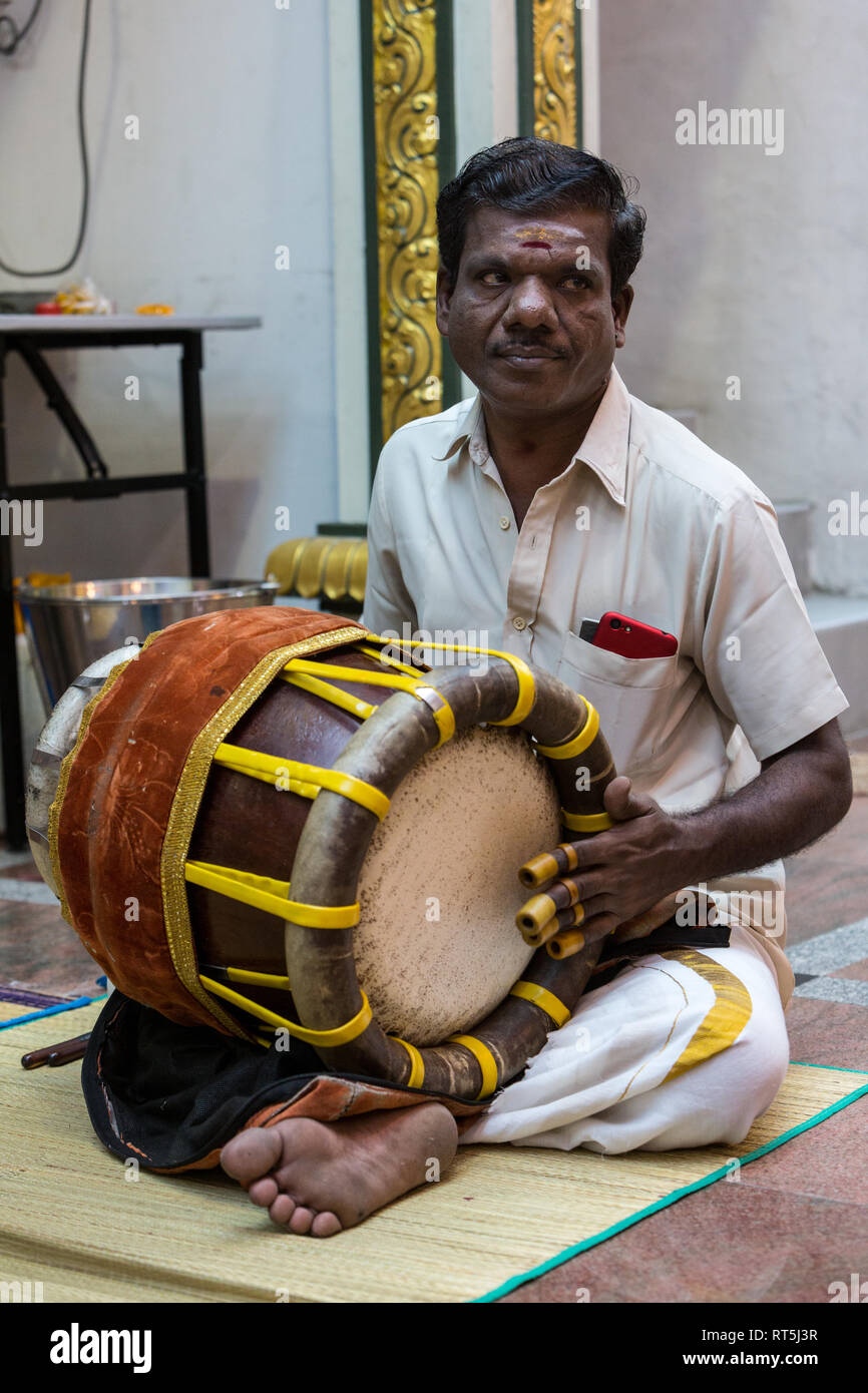 Player Playing Thavil, a South Indian Drum, Hindu Temple, Sri Maha Mariamman, Navarathri Celebrations, George Town, Penang, Malaysia. Stock Photo