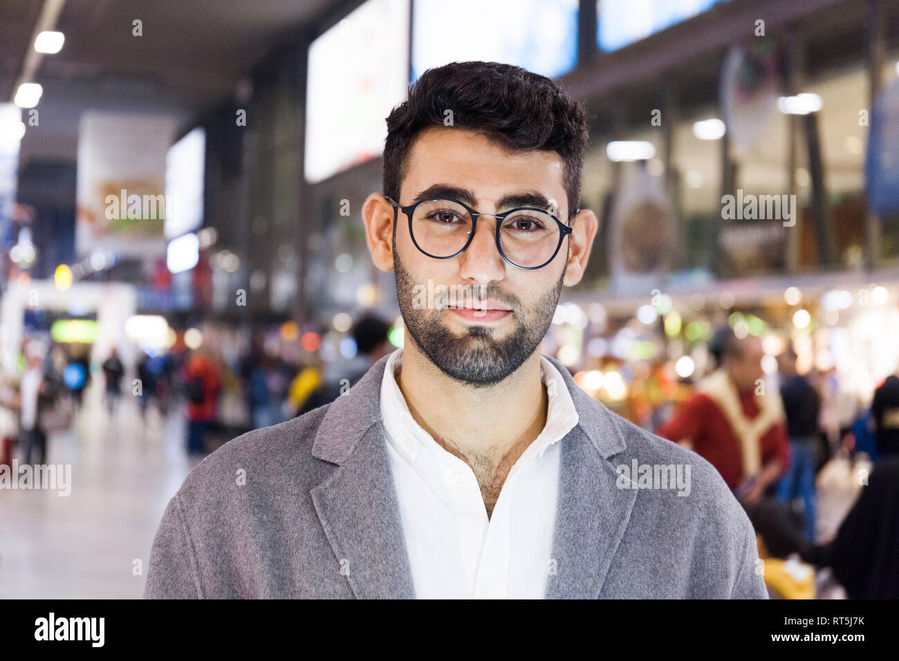 Germany, Munich, portrait of young businessman at central station Stock Photo