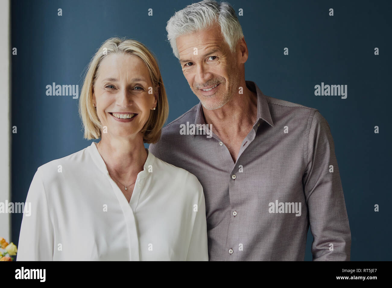 Portrait of smiling mature couple Stock Photo