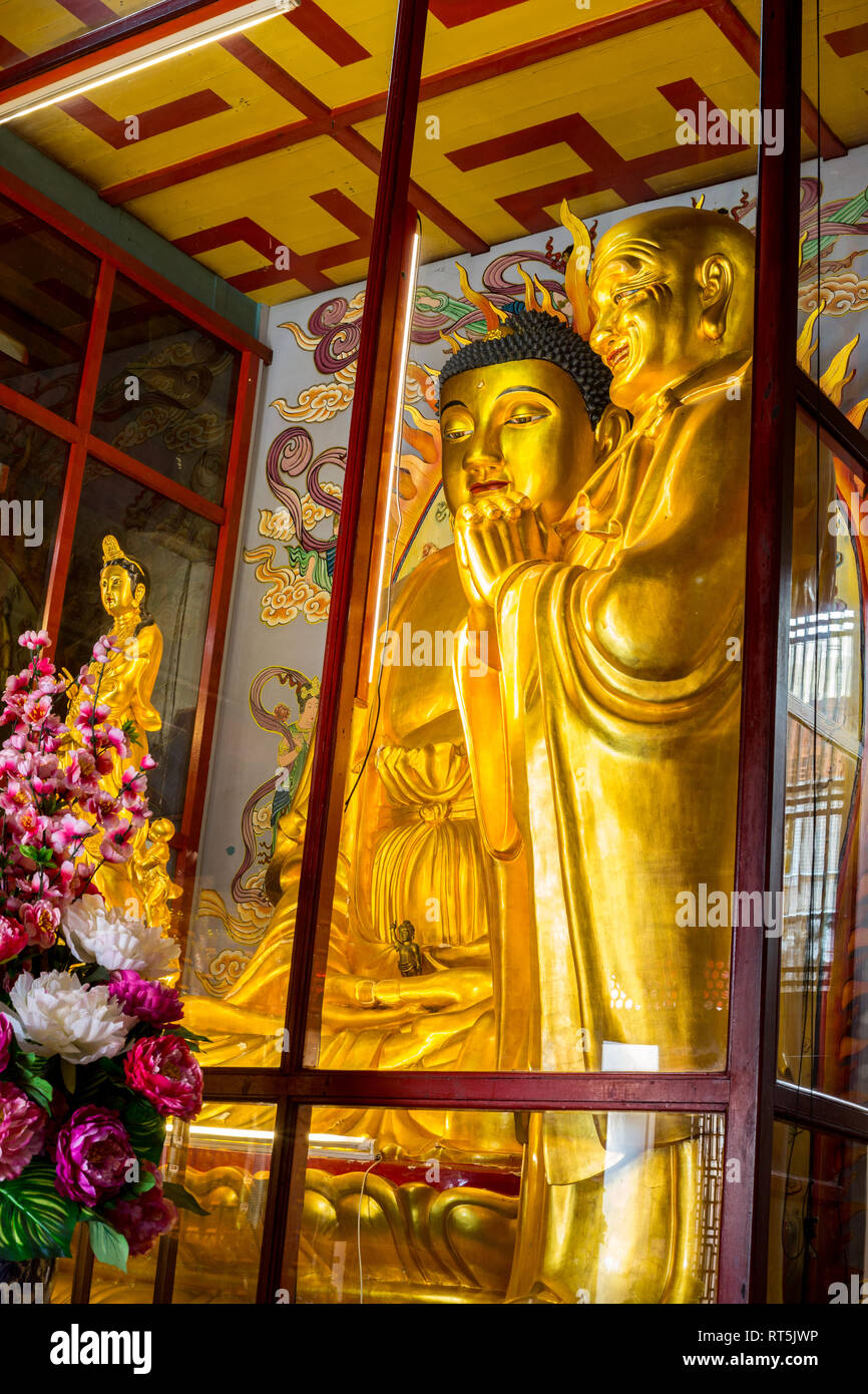 Buddha Statues in Main Prayer Hall, Kek Lok Si Buddhist Temple, George Town, Penang, Malaysia. Stock Photo