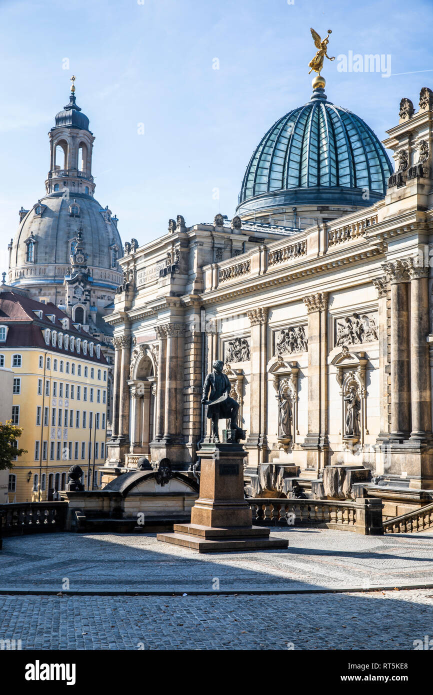 Germany, Dresden, monument of Gottfried Semper, academy of fine arts and dome of Church of Our Lady Stock Photo