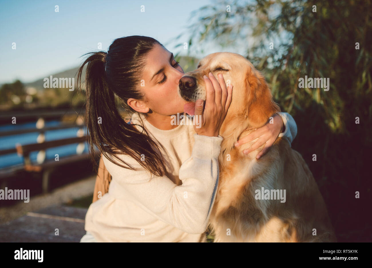Woman kissing dog hi res stock photography and images Alamy