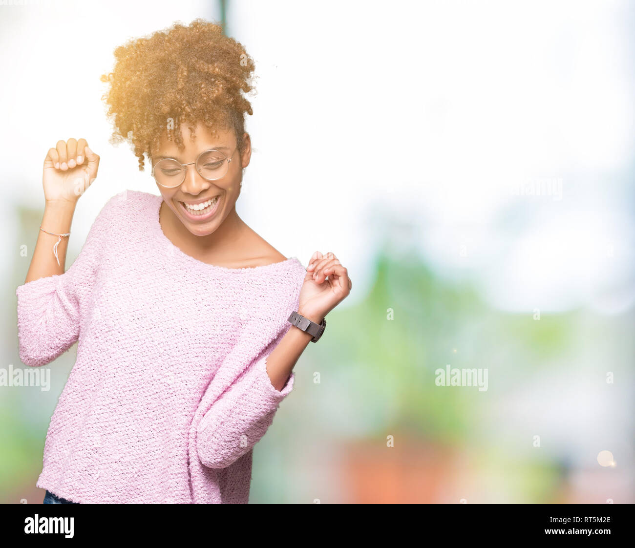Beautiful young african american woman wearing glasses over isolated ...