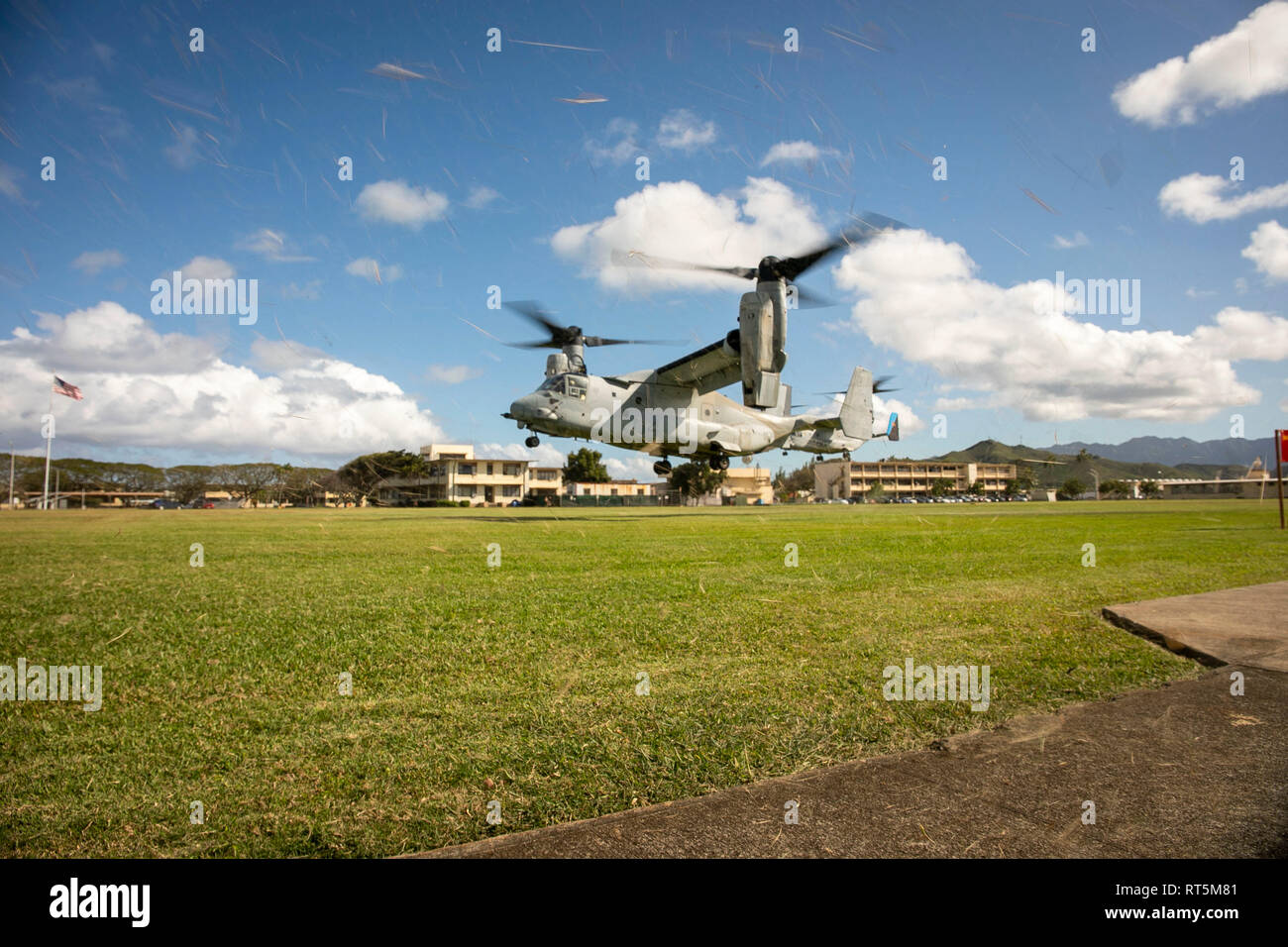 Two MV-22B Osprey tiltrotor helicopter assigned to Marine Medium Tiltrotor Squadron 268 take off from Landing Zone 216 during a downed aircraft scenario, Marine Corps Base Hawaii, Feb. 27, 2019. U.S. Marines with Weapons Company, 2nd Battalion, 3rd Marine Regiment and VMM-268 along with the A-10 Thunderbolt II attack aircraft assigned to 442nd Fighter Wing from Whiteman Air Force Base, Missour conduct training consisting of a simulated tactical recovery of aircraft personnel scenario and a combat search and rescue scenario. (U.S. Marine Corps photo by Sgt. Zachary Orr) Stock Photo