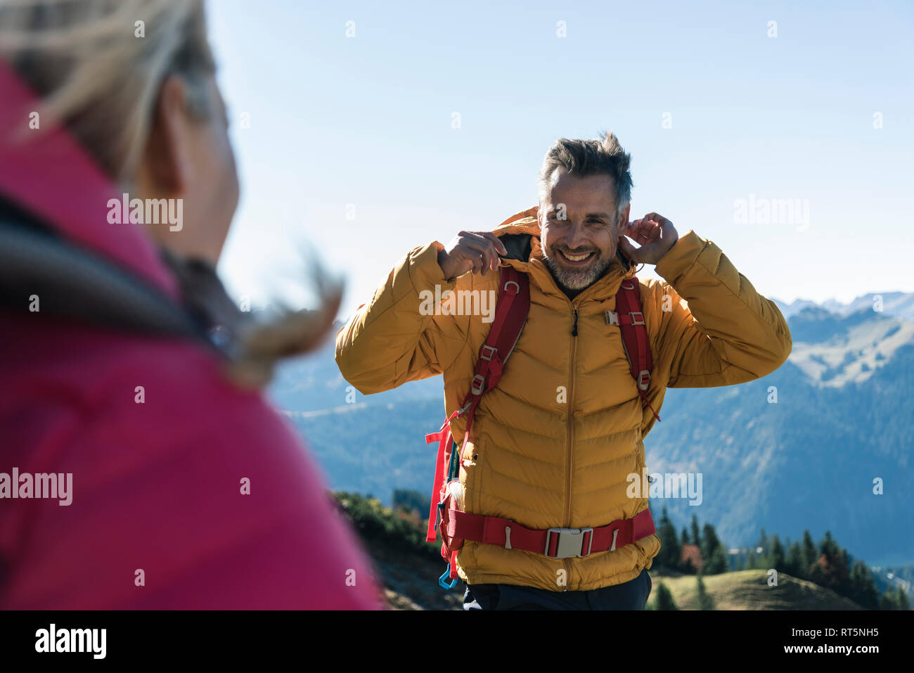 Happy man hiking mountains hi-res stock photography and images - Alamy