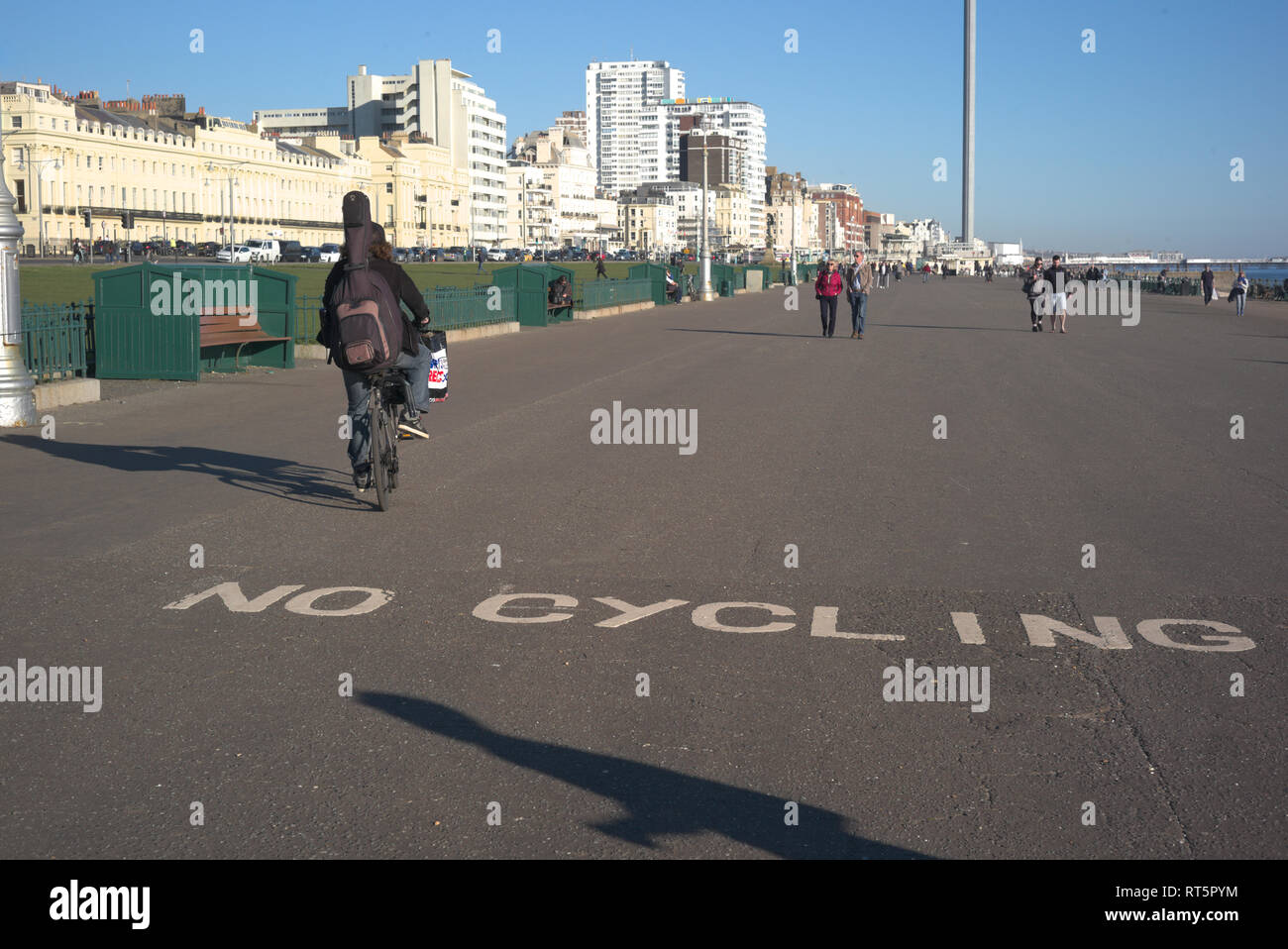 Brighton, England on February 25, 2019. No cycling on the promenade. Stock Photo
