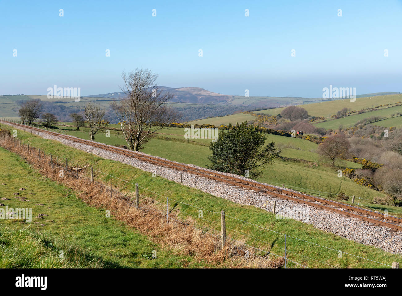 Parracombe, Devon, England, UK, February 2019. A view of the Heddon Valley on Exmoor with a narrow guage railway line of the Lynton & Barnstaple Railw Stock Photo
