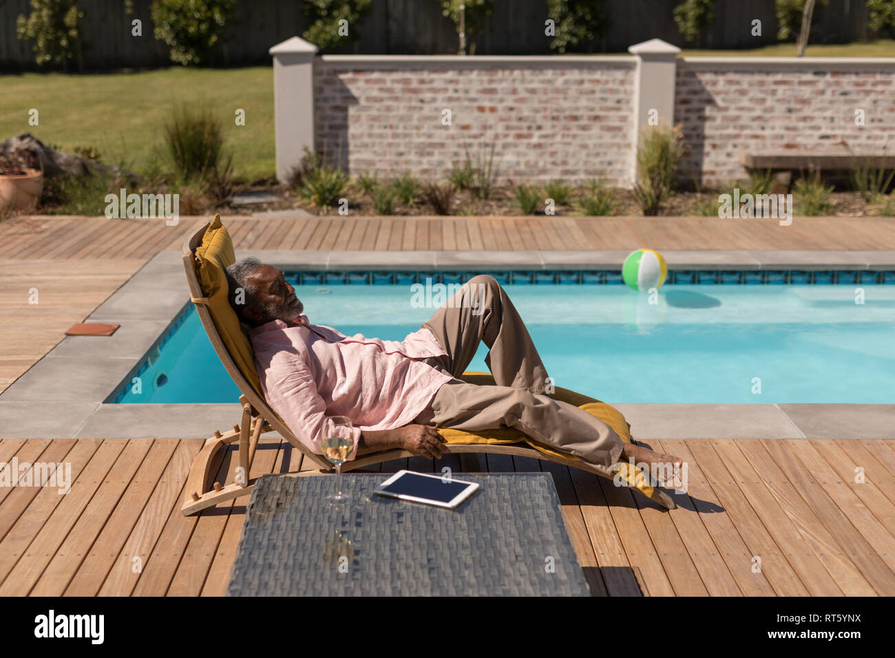 Man sleeping on sun lounger hi res stock photography and images