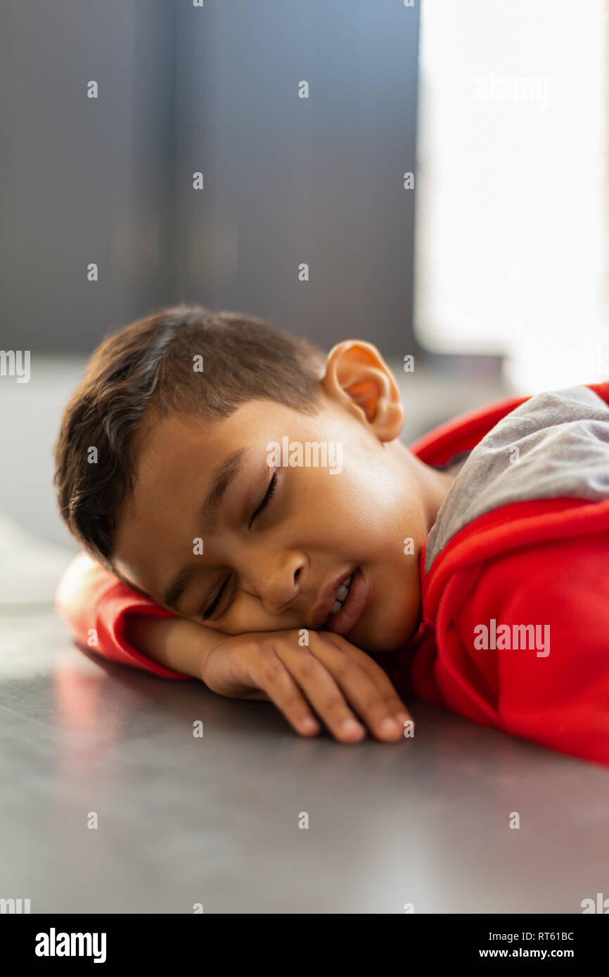 schoolboy mouth Schoolboy sleeping with mouth open at desk in a classroom Stock Photo -  Alamy