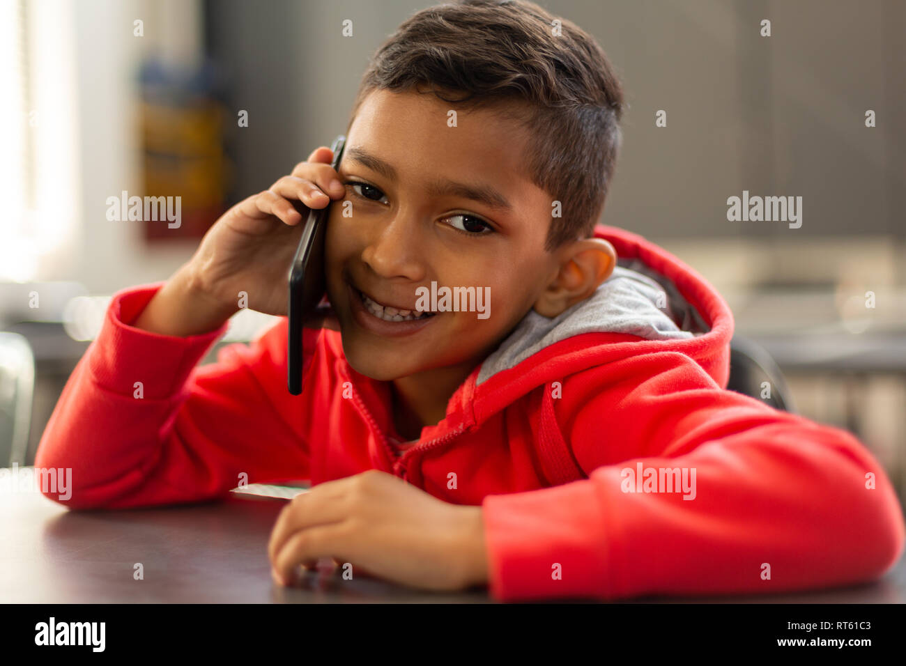 Mobile phone school classroom desk hires stock photography and images