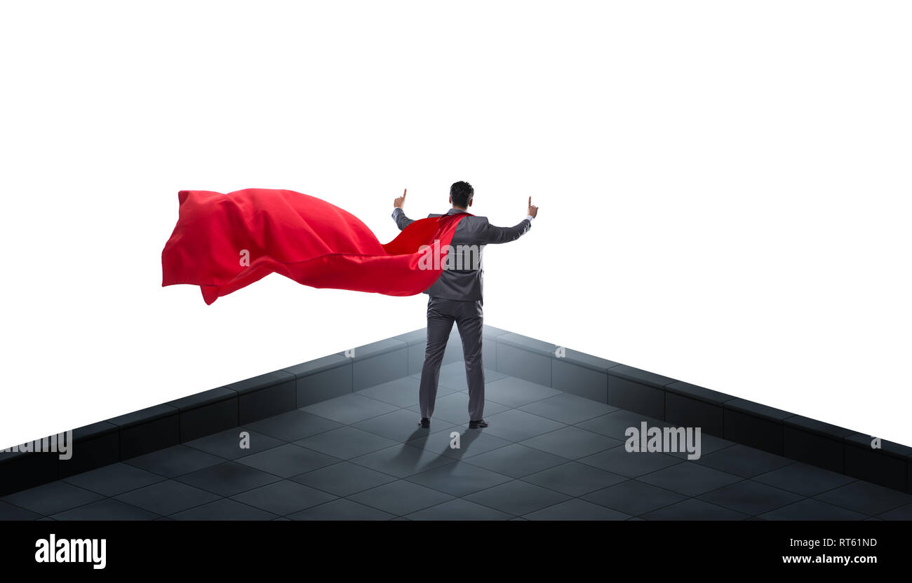Superhero businessman on top of building Stock Photo - Alamy