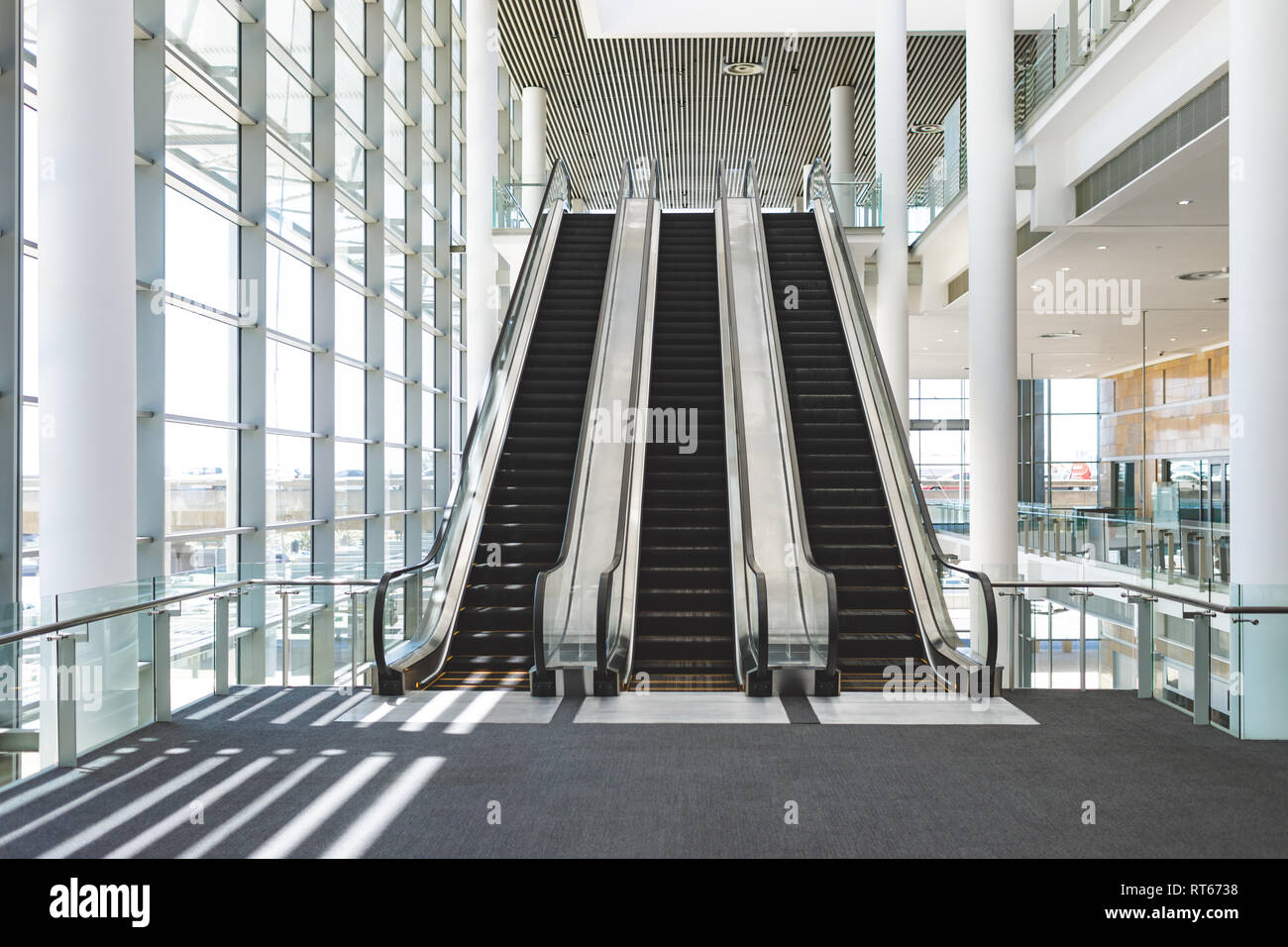 Escalators in an office building Stock Photo