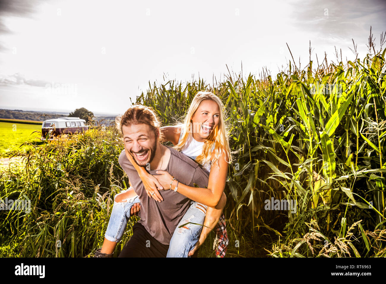 Carefree couple in cornfield Stock Photo