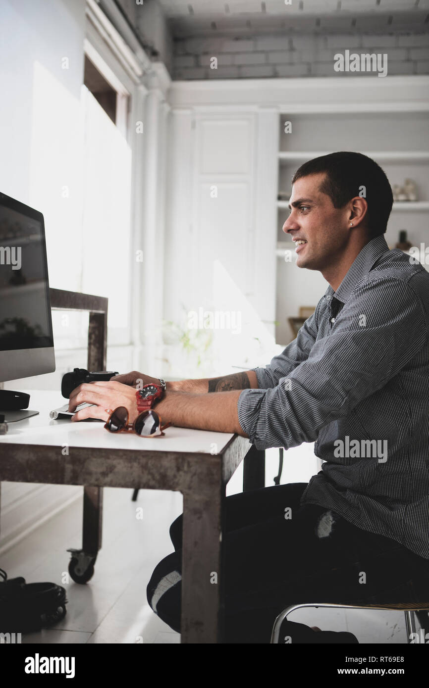 Young man studies desk hi-res stock photography and images - Alamy
