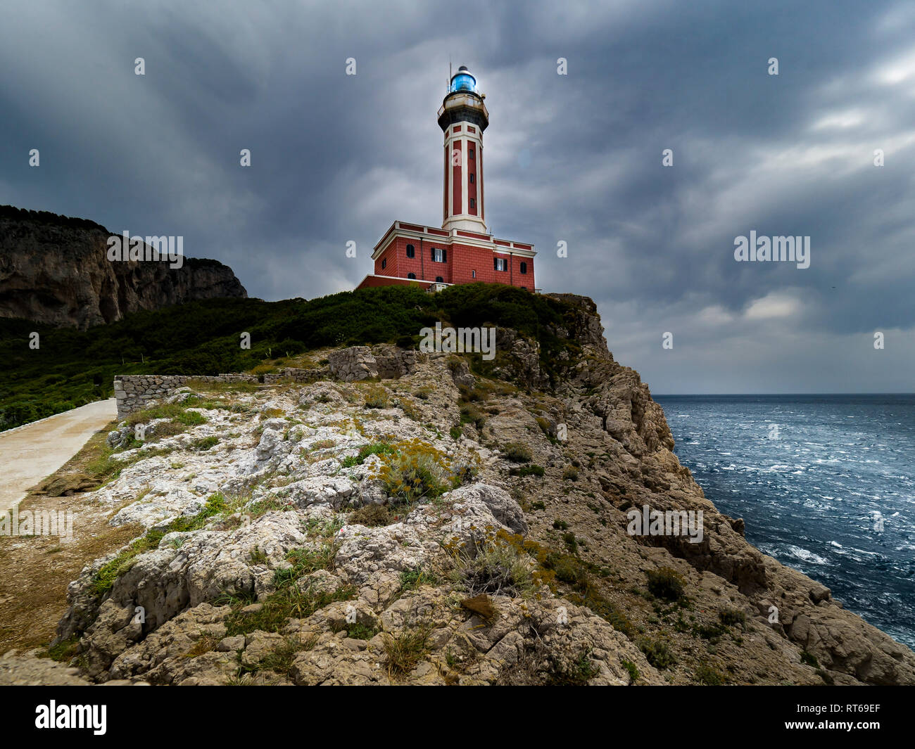 Italy, Campania, Capri, Punta Carena, Faro Di Punta Carena Lighthouse Stock Photo