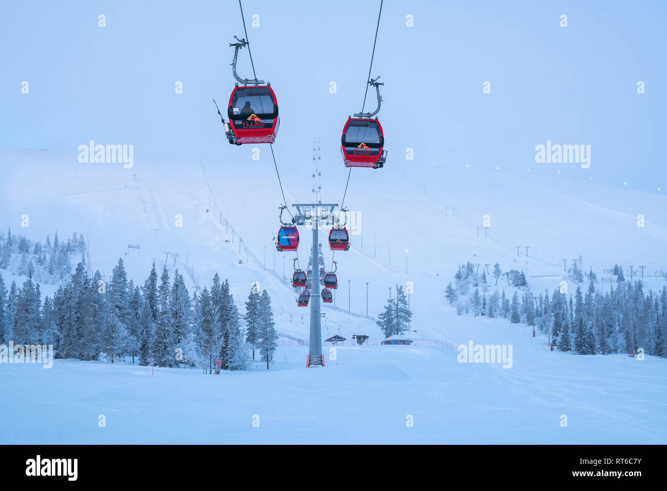 Ylläs ski resort and gondola lift with people in them in Kolari and Äkäslompolo, Finland Stock Photo