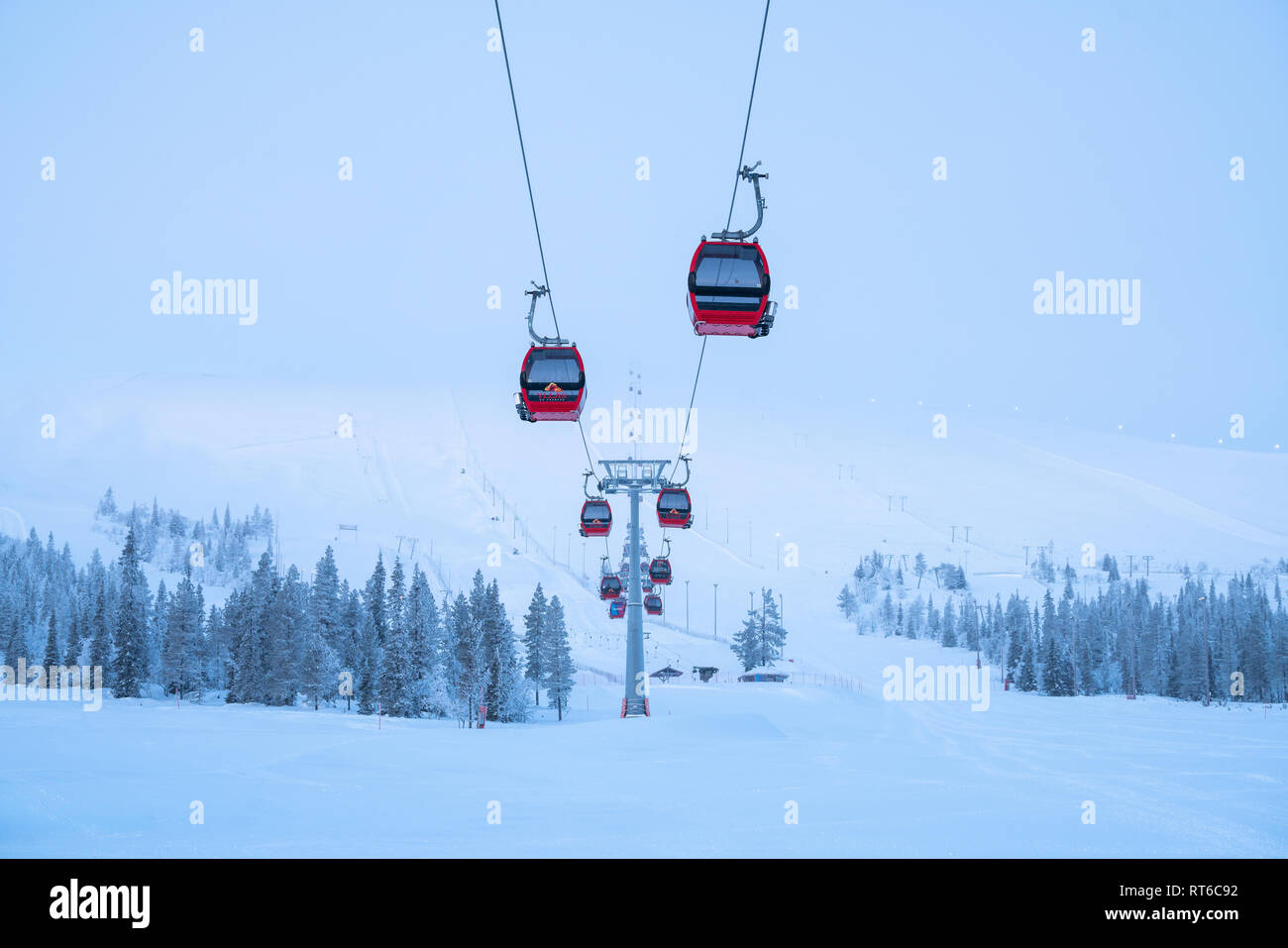Ylläs ski resort and gondola lift with people in them in Kolari and Äkäslompolo, Finland Stock Photo