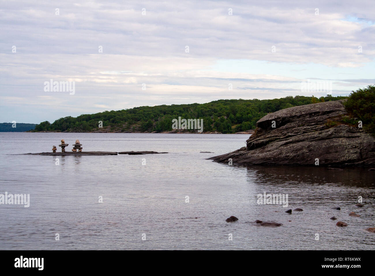 Inuit stone figures in Huron Lake, Ontario Stock Photo