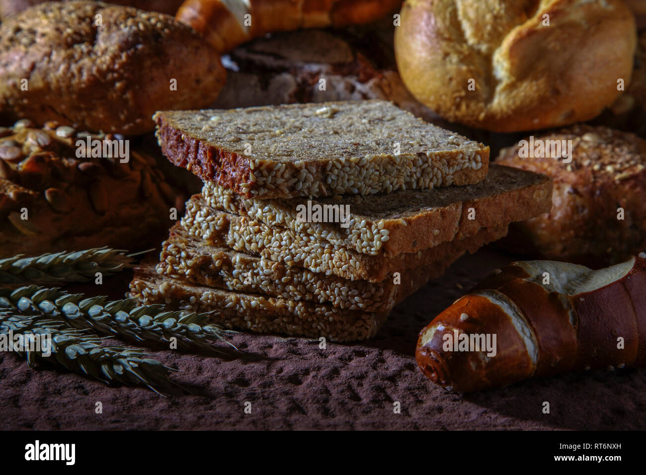 different types of bread on stone background Stock Photo