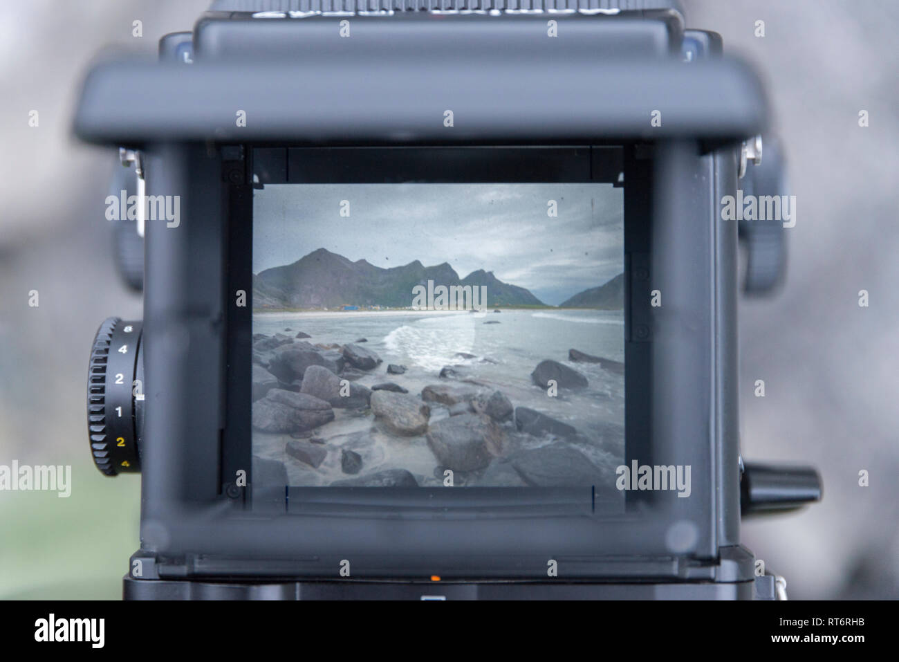 Looking through the viewfinder of Mamiya RZ67 medium format film camera. Stock Photo