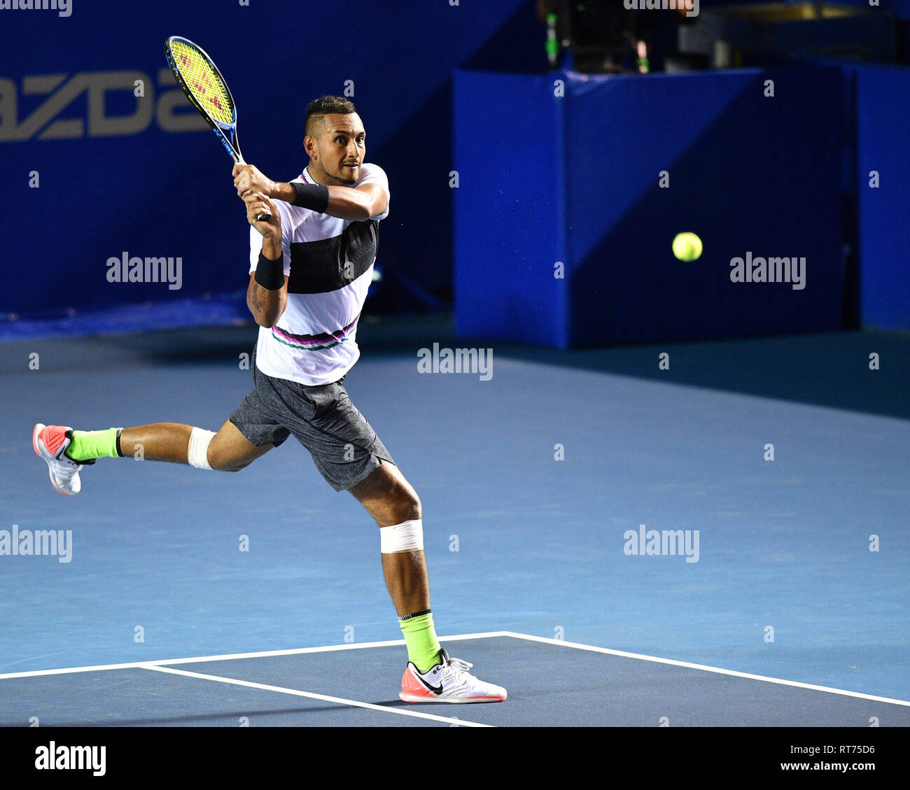 190228) -- ACAPULCO, Feb. 28, 2019 -- Nick Kyrgios of Australia hits a  return during the men's singles second round match against Rafael Nadal of  Spain at the 2019 ATP Mexican Open