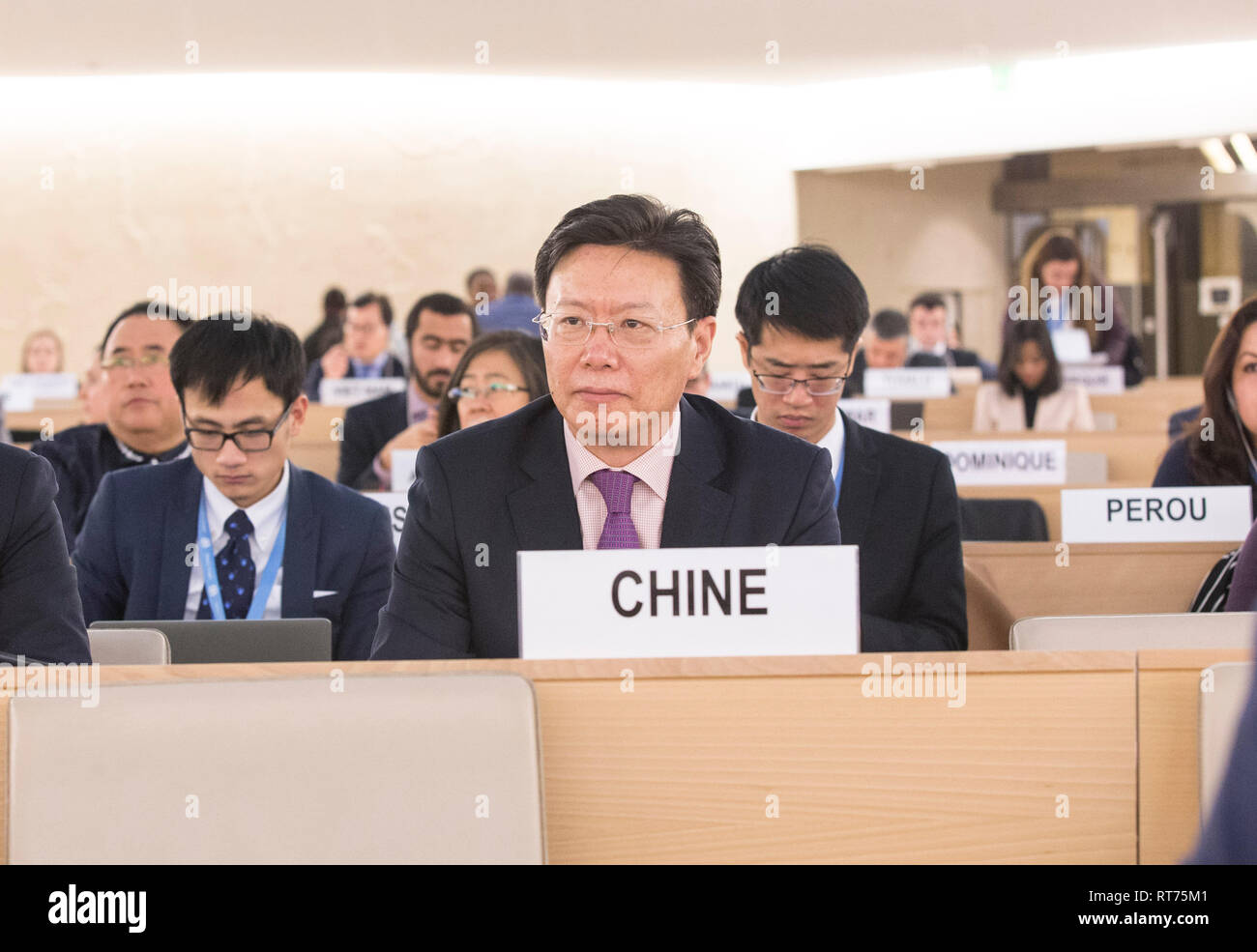 (190228) -- GENEVA, Feb. 28, 2019 (Xinhua) -- Yu Jianhua, head of the Chinese Mission to the UN Office in Geneva, attends the 40th session of the UN Human Rights Council (UNHRC) in Geneva, Switzerland, Feb. 27, 2019. The 56 ethnic groups in China, living together like brothers and sisters, are all parts of the big family of the Chinese nation, Yu Jianhua told the UNHRC session. 'The people of all ethnic groups are tightly held together like pomegranate seeds, and together they are making arduous efforts for the great rejuvenation of the Chinese nation where they can all live a happy life,' Yu  Stock Photo