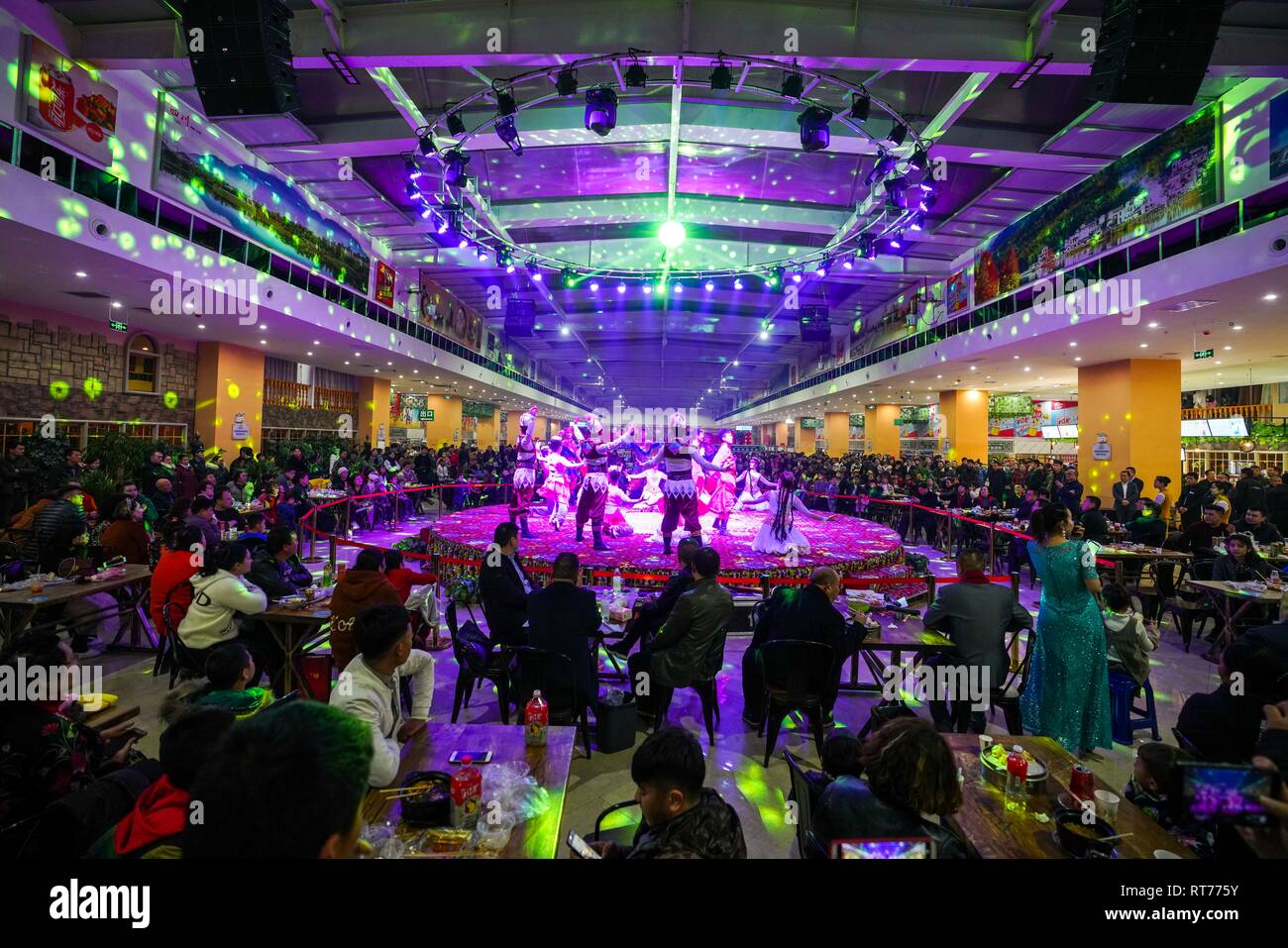 190228 Urumqi Feb 28 2019 Xinhua Tourists Enjoy Performance And Food In Hotan Northwest China S Xinjiang Uygur Autonomous Region Feb 14 2019 Xinjiang Has Received More Than 3 Million Tourists