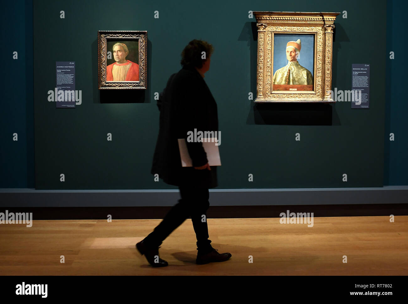 Berlin, Germany. 28th Feb, 2019. A visitor looks at the exhibition 'Mantegna and Bellini. Master of the Renaissance' in the Picture Gallery at the Cultural Forum the painting 'Cardinal Ludovico Trevisan (l)' by Andrea Mantegna and 'The Doge Leonardo Loredan' by Giovanni Bellini. The special exhibition of the National Museums in Berlin and the National Gallery London in cooperation with the British Museum runs from 01.03.2019 to 30.06.2019. Credit: Britta Pedersen/dpa/Alamy Live News Stock Photo