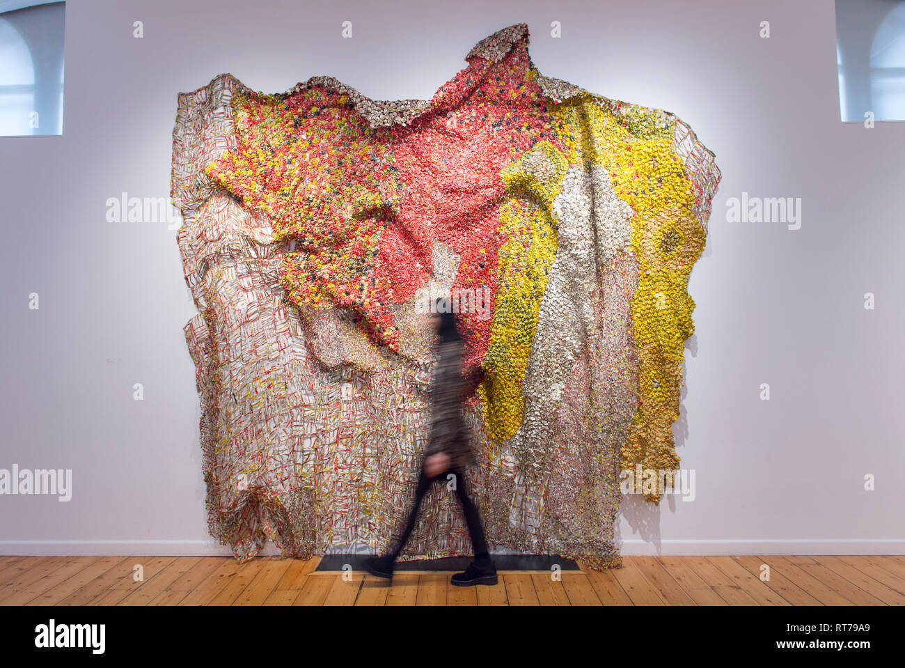 October Gallery, London, UK. 28 February, 2019. El Anatsui: Material Wonder  features the Ghanaian sculptors distinctive large and intricate metal wall  sculptures made from assemblages of Aluminium bottle tops from alcohol  recycling