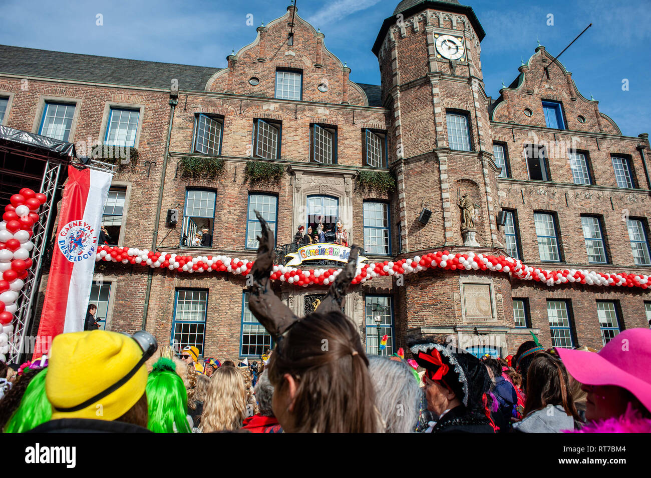 Dusseldorf, Rhine, Germany. 28th Feb, 2019. Princess of the Carnival is seen cutting the tie of the Mayor of Dusseldorf. On the first day of the carnival or Altweiberfastnacht, the women (called MÃ¶hnen) storm the City Council Offices to capture the Lord Mayor and take over the administration of the City for the night and that is the official opening of the street carnival in the old city of DÃ¼sseldorf. In Rhineland on this day, the ladies cut the ties of the men, it does not matter if they are in a position of importance or his age. Credit: ZUMA Press, Inc./Alamy Live News Stock Photo
