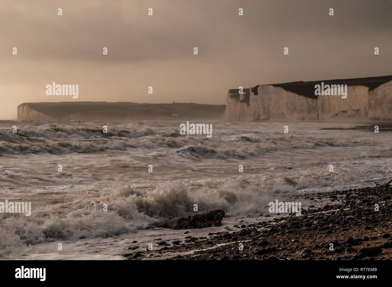 Birling Gap, Eastbourne, East Sussex, UK. 28th Feb, 2019. Seasonal weather returns .Cooler wind from the West whips up the sea which was like a mill pond yesterday. Stock Photo