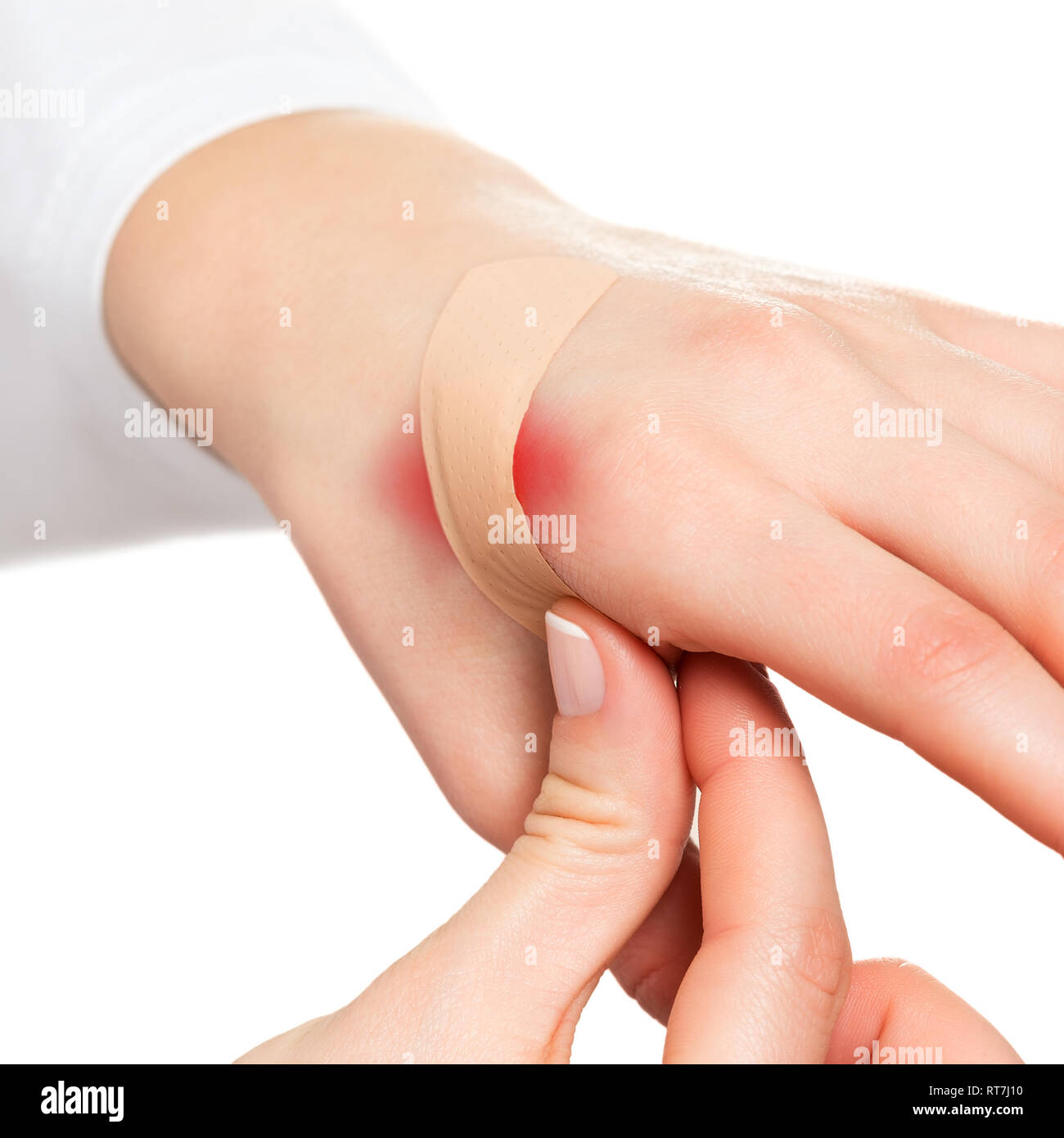 Hand and plaster on hurt skin Stock Photo