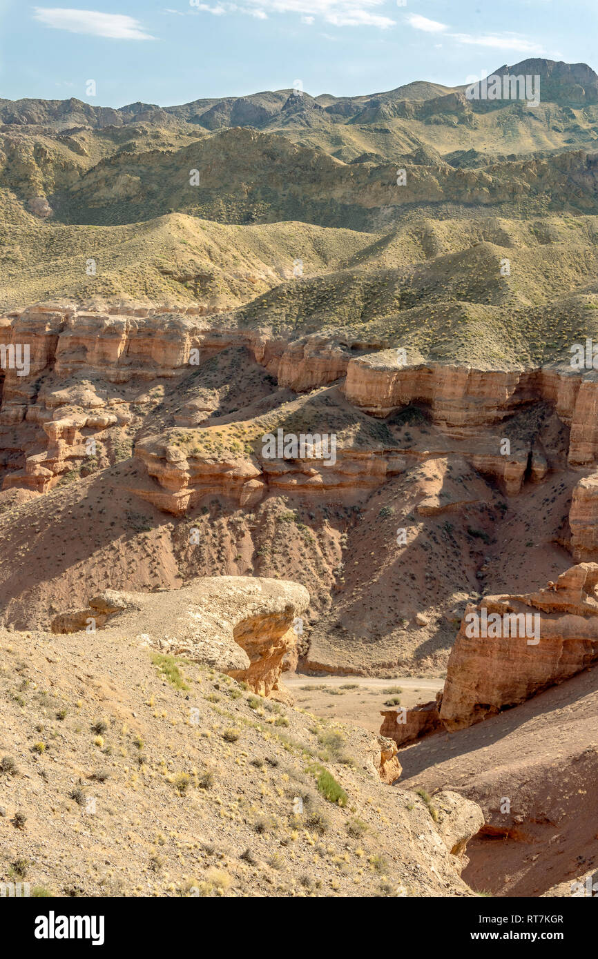 Charyn canyon with striated bands of red sandstone, Kazakhstan Stock Photo