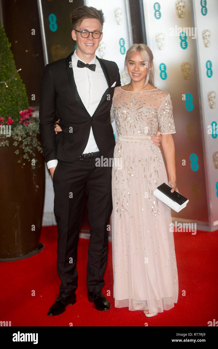 Caspar Lee and Ambar Driscoll at the 72nd British Academy Film Awards