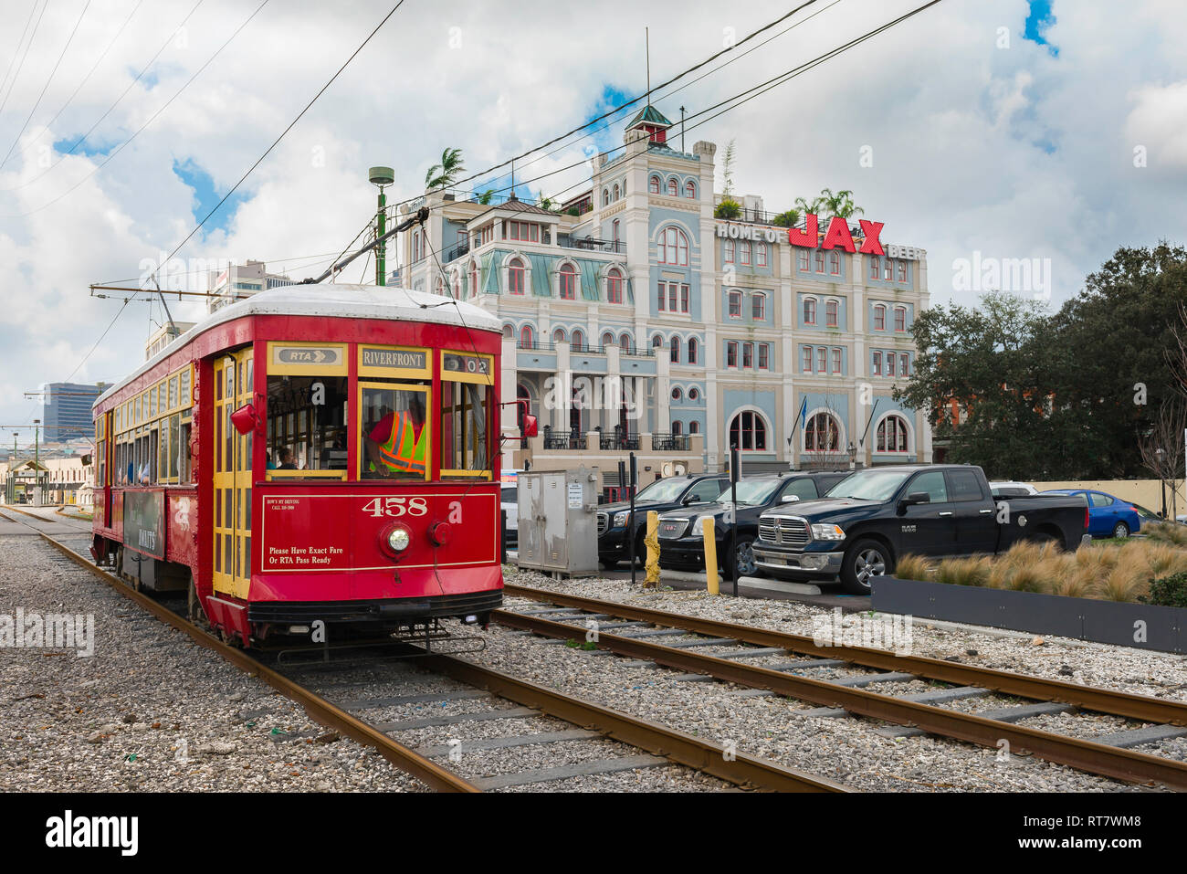 New Orleans streetcar, view of a New Orleans streetcar passing the Jax Brewery building in the Riverfront district of the city, Louisiana, USA. Stock Photo