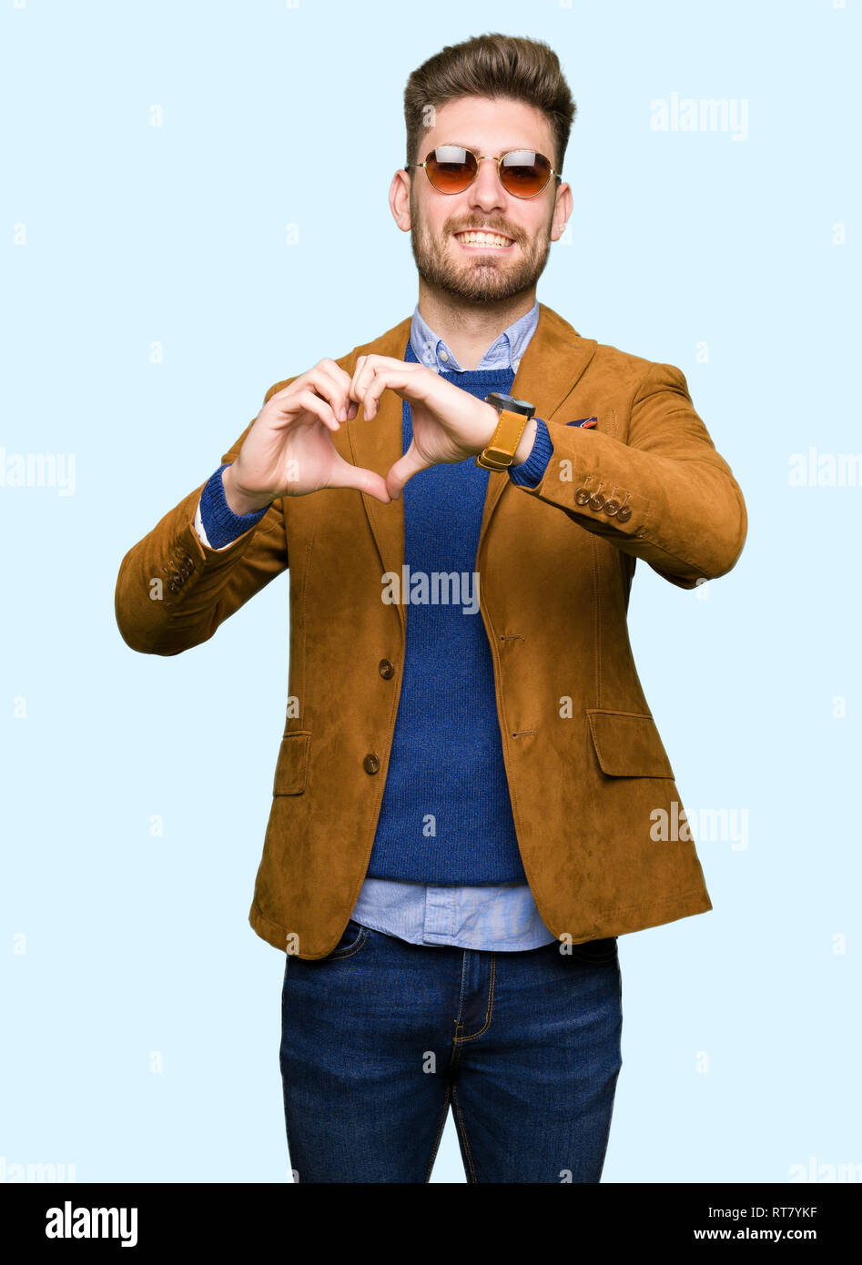 Young Handsome Elegant Man Wearing Sunglasses Smiling In Love Showing Heart Symbol And Shape