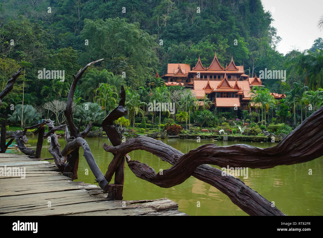 Made from wood Temple in the forest Wat Tham Khao Wong, Uthai Thani, Thailand. Stock Photo