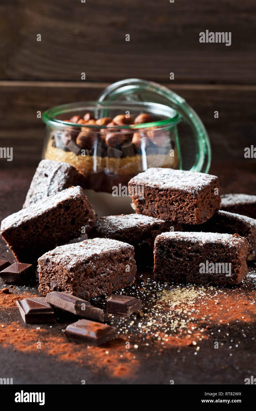 Brownies and glass of baking mix for preparing brownies Stock Photo