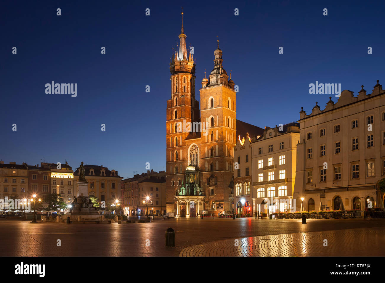 Poland, Krakow, Old Town, city skyline with St. Mary's Basilica at night Stock Photo