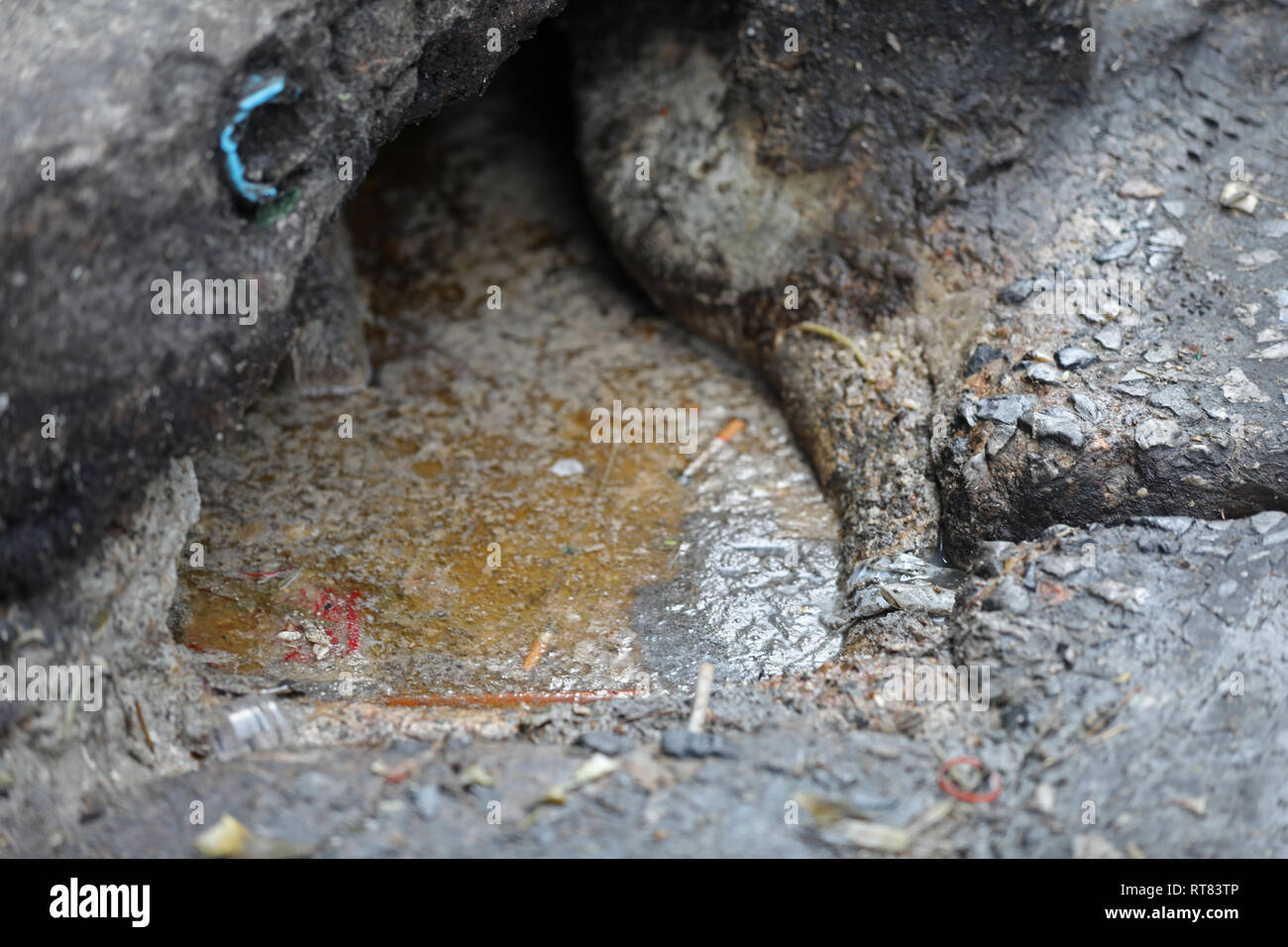 Urine dirt puddle in the city Stock Photo Alamy