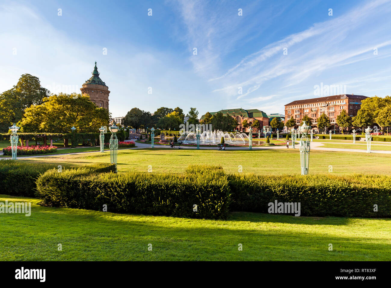Germany, Mannheim, Friedrichsplatz with fountain and water tower in the background Stock Photo