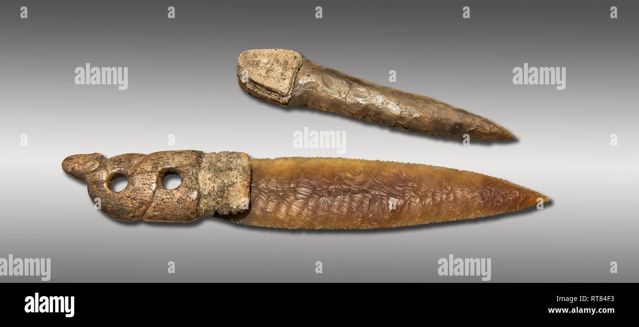 Brown obsidian dagger with a bone handle carved into the shape of a snake. It is believed this may have been a ritual dagger. Catalhoyuk Collections.  Stock Photo